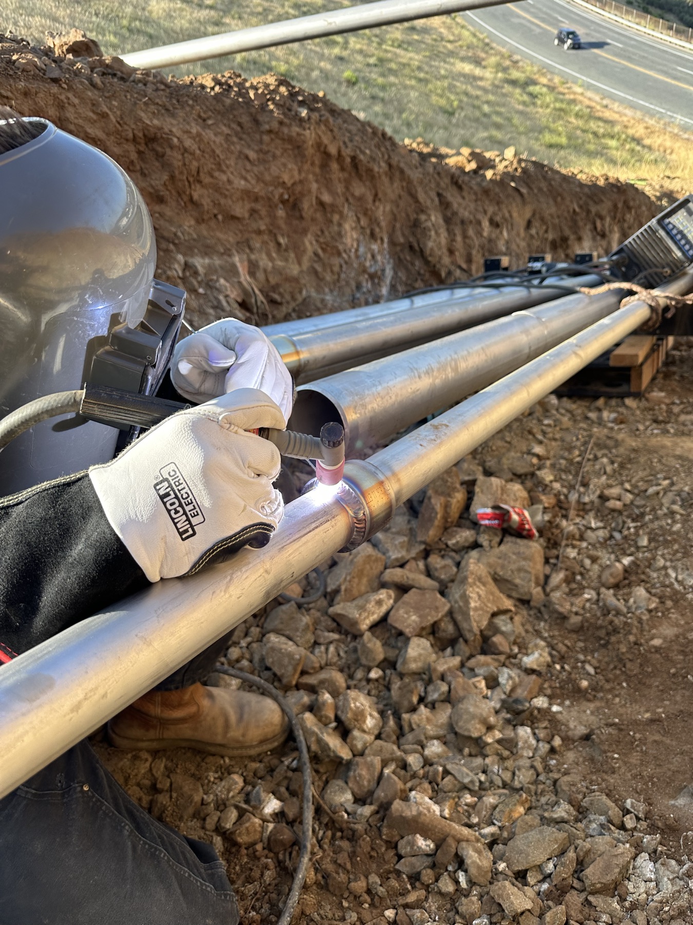 Jones welder working on piping in the field